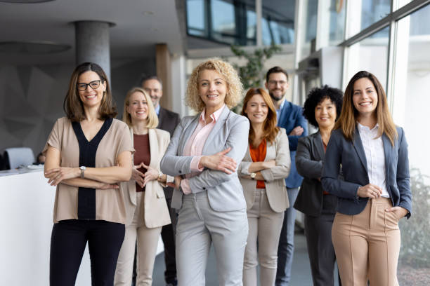 istock Confident Business Group Smiling in Modern Workplace 2205446764