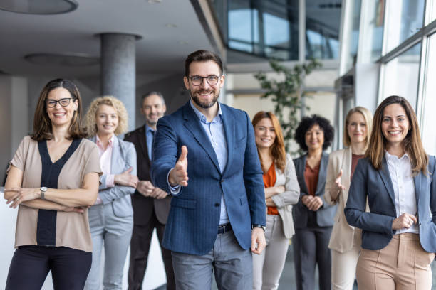 istock Enthusiastic business man extending hand for partnership 2205446767