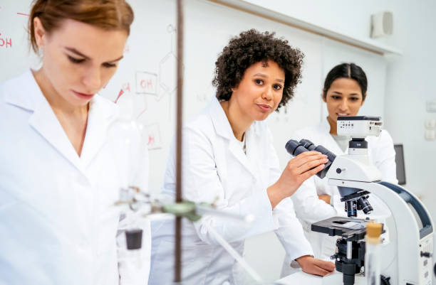 istock Diverse Female Students Collaborating in University Laboratory Research 2205446810