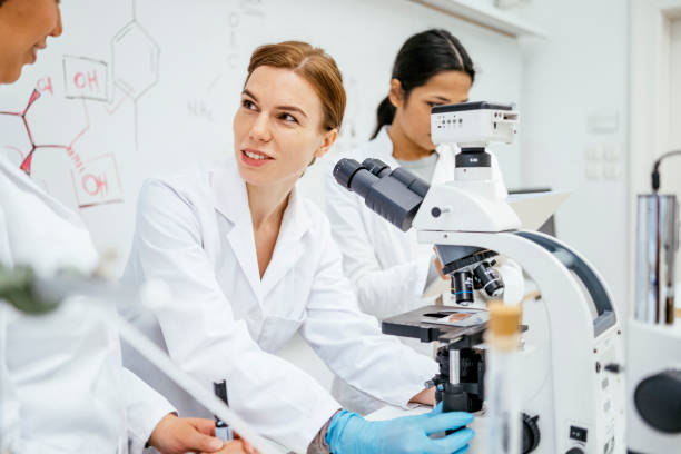 istock Focused Female Student Collaborating in University Laboratory Research 2205446815