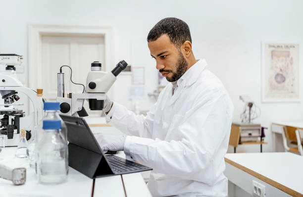 istock Confident Mixed Race Male Student Working in University Laboratory 2205446821