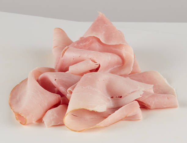 istock fresh ham bacon slices isolated nature background with clipping path 2205448073