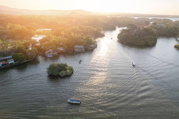 istock Boat tours theme in sunset gold hour 2205458439