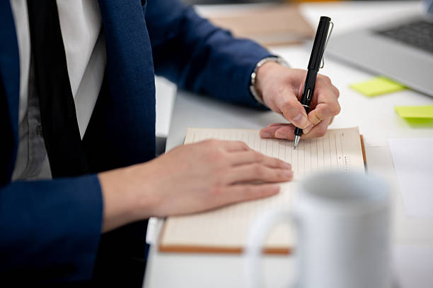 istock Businessman sitting and working in an office 2205458711
