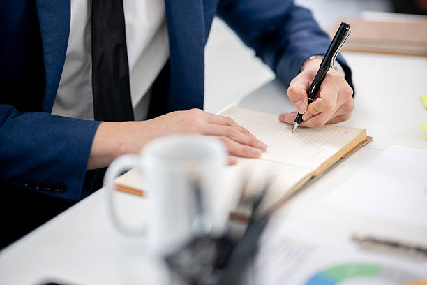 istock Businessman sitting and working in an office 2205458714