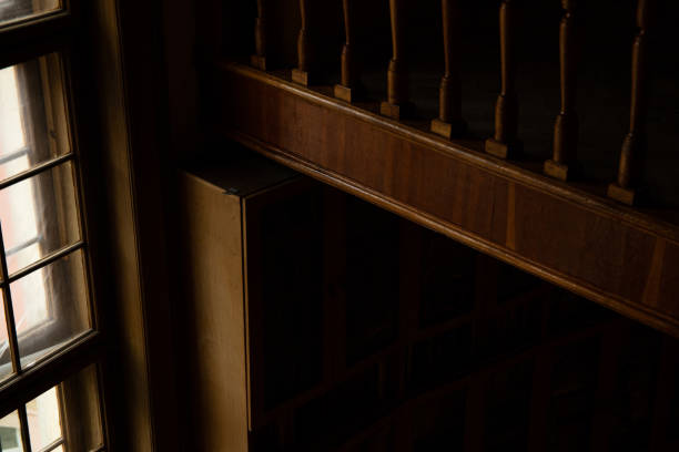 The living room, hallway, and stairs in the library