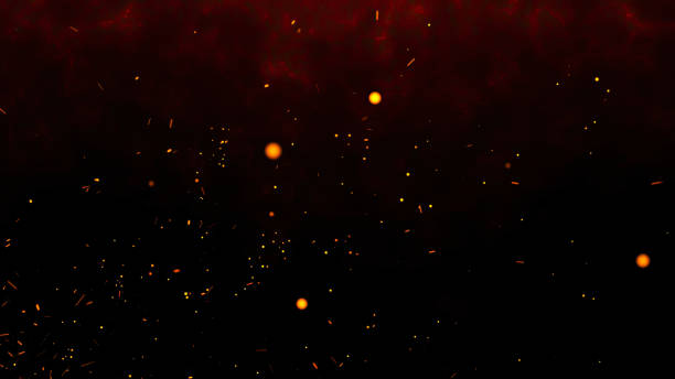 istock Burning red hot sparks rise from light fire  background of bonfire. 2205462478
