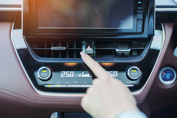 istock Finger presses the emergency stop button inside the car. Safety and transportation concept 2205462505