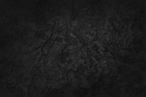istock Dark gray black slate stone wall texture background in natural pattern for decorative interior and exterior. 2205462737