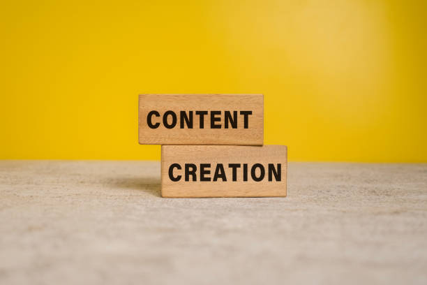 istock content creation words on wooden blocks on yellow background 2205465415
