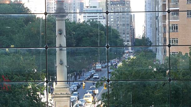 New York City Columbus Circle on Broadway street, Central Park. Manhattan Midtown architecture, USA. New York City, United States - 14 Sept 2023: Columbus Circle on Broadway street near Central Park. Manhattan Midtown architecture, USA. Urban life, road car traffic thru window of Deutsche Bank Center time warner center columbus circle pictures stock pictures, royalty-free photos & images