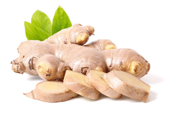istock fresh ginger slices with green leaves. 2205472749