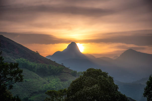 istock Peaceful Sunset Over Tropical Green Valleys in Brazil 2205472756