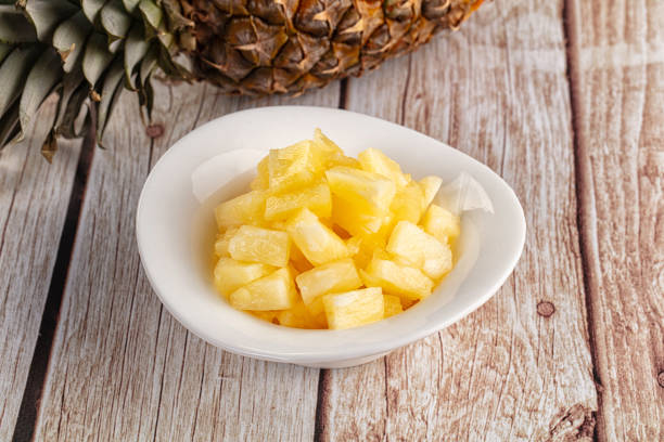 istock Sweet canned pineapple fruit pieces 2205475305