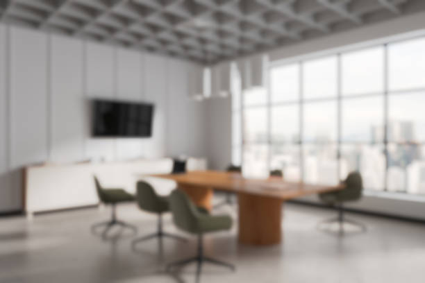 istock Modern office meeting room with large windows and wooden table. 3D Rendering 2205478048