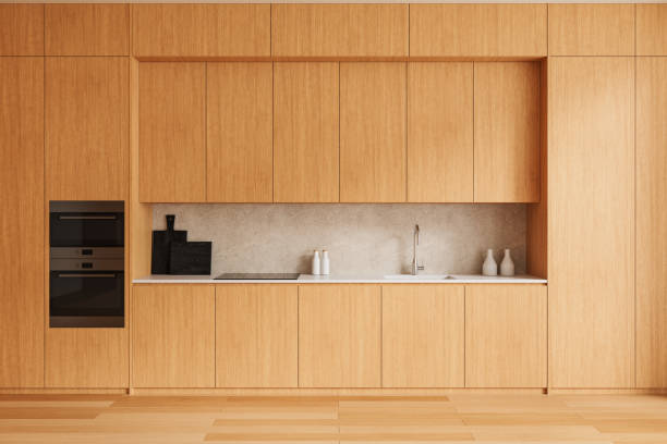 istock Modern wooden kitchen with built-in appliances and minimalistic design. 3D Rendering 2205478439