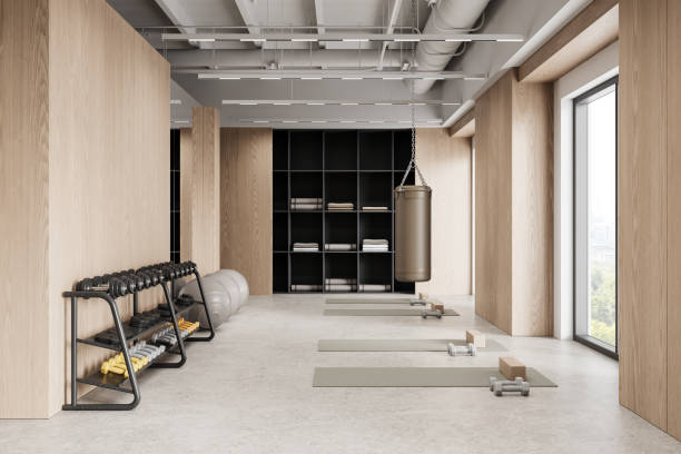 istock Modern gym interior with wooden wall panels and minimalist design. 3D Rendering 2205478808
