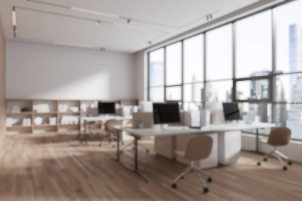 istock Modern office interior with large windows and wooden flooring. 3D Rendering 2205478986