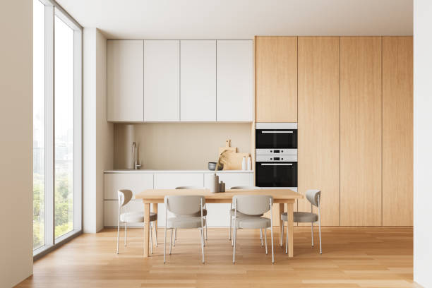 istock Modern kitchen with wooden cabinets and dining table. 3D Rendering 2205479033