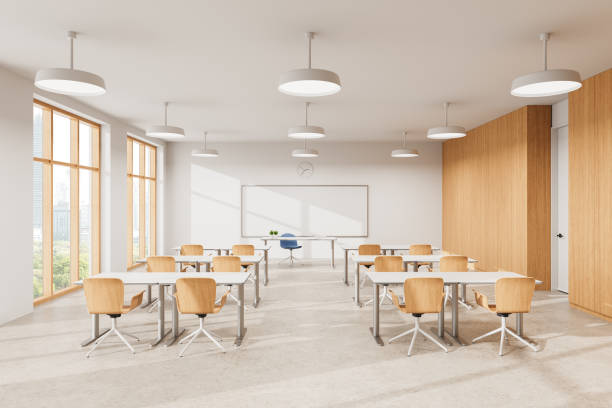 istock Modern Classroom Interior with Wooden Chairs and Tables. 3D Rendering 2205479210