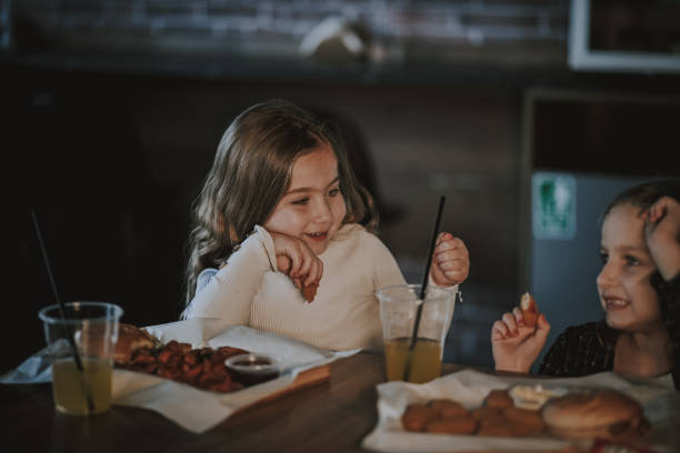 istock Sisters with smash burgers 2205479999