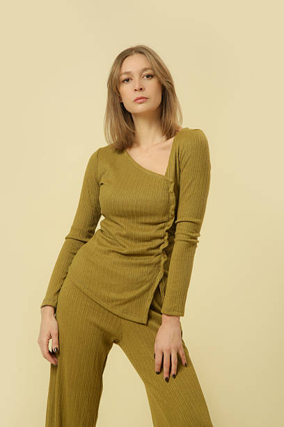 istock Studio photos of female model wearing basic comfortable knitted oregano green set, fall winter fashion collection. 2205481548
