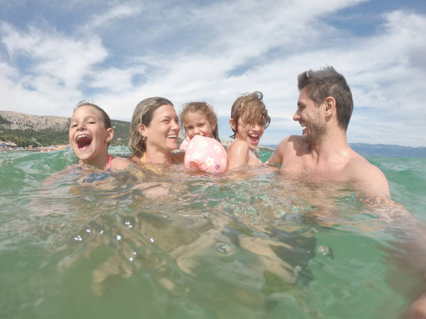 Young family enjoying summer vacation.Young family enjoying summer vacation.