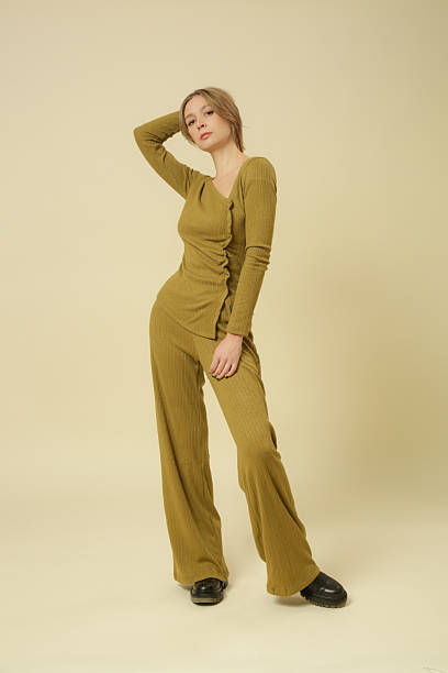 istock Studio photos of female model wearing basic comfortable knitted oregano green set, fall winter fashion collection. 2205482153