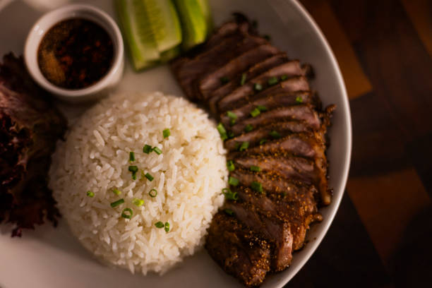 Steamed Rice And Grilled Meat On Plate, Background for advertising and wallpaper in food and culture scene