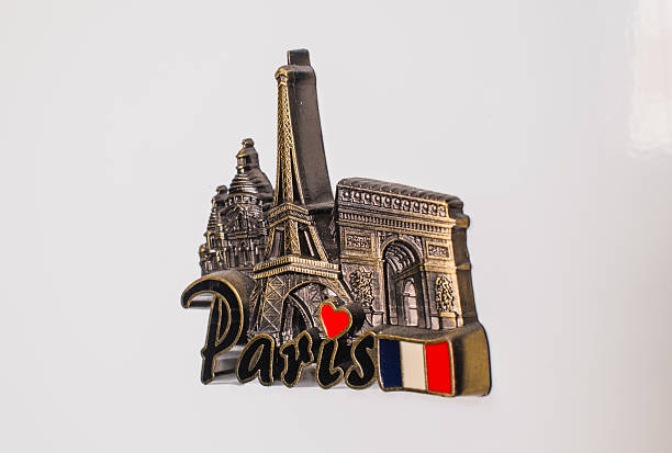 istock Souvenir fridge magnet from Paris, France, on white 2205484519