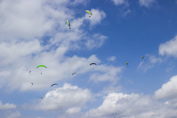 Paragliding athletes perform demonstration flights at the Kapıkaya Festival, which is traditionally held every year. 07/28/2018 , Bafra /Samsun /Türkiye