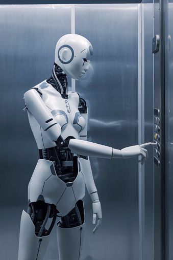 Button Robotics Humanoid Robot Pressing A Button In The Elevator Stock Photo - Download ...