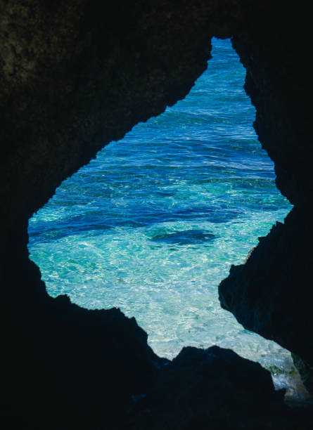istock View of Tropical Shallow waters from a Hidden Cave 2205496001