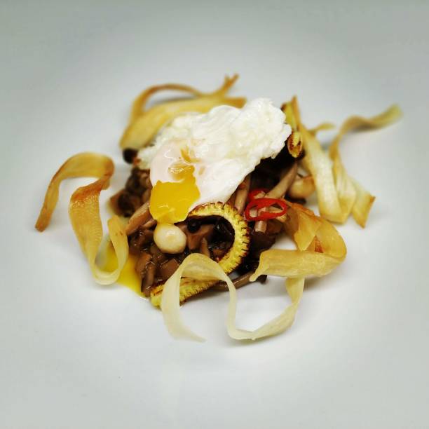 istock Tubers with quail egg 2205497649