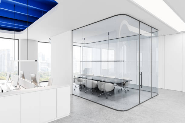 istock Modern open office with glass-walled meeting room and city view. 3D Rendering 2205500448