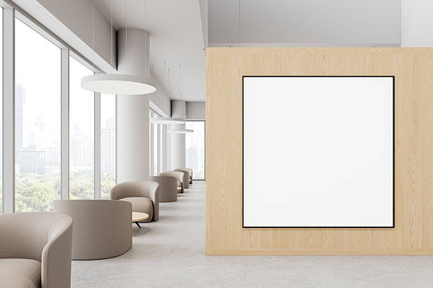 istock Modern office lounge with empty poster frame on wooden wall. 3D Rendering 2205500807
