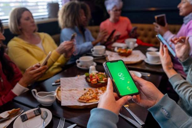 istock Sending Over Money Via Smart Phone 2205501124