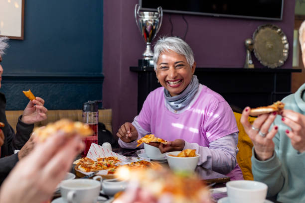 istock Cheerful Moments Shared With Food And Friends 2205502308
