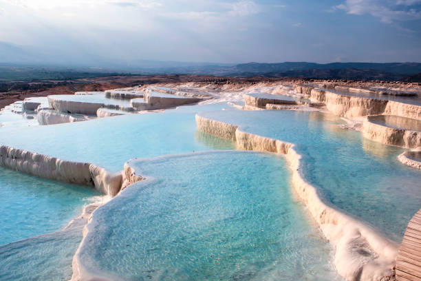 istock Pamukkale is a place where white texture, healing waters and history come together. Cloud, reflection, historical structures from the Hellenistic and Roman periods. healing spring water, health tourism 2205503966