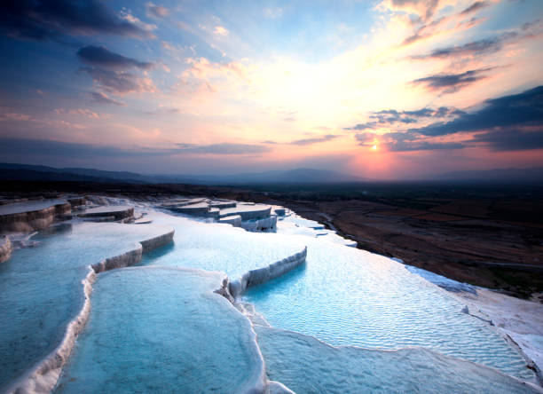 istock Pamukkale is a place where white texture, healing waters and history come together. Cloud, reflection, historical structures from the Hellenistic and Roman periods. healing spring water, health tourism 2205503995
