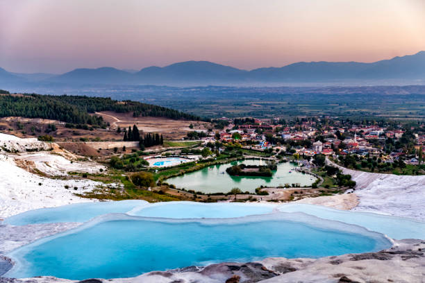 Pamukkale is a place where white texture, healing waters and history come together. Cloud, reflection, historical structures from the Hellenistic and Roman periods. healing spring water, health tourism