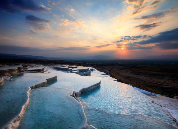 istock Pamukkale is a place where white texture, healing waters and history come together. Cloud, reflection, historical structures from the Hellenistic and Roman periods. healing spring water, health tourism 2205504106