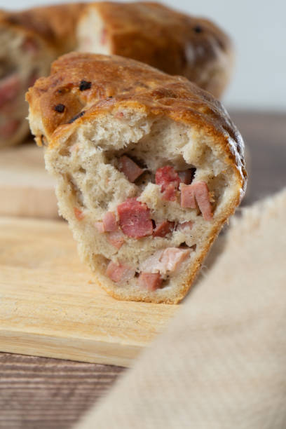 Rustic Neapolitan casatiello with meat, eggs and cheese