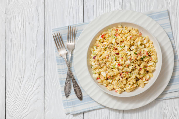 istock macaroni salad with celery, eggs, red bell pepper 2205507282
