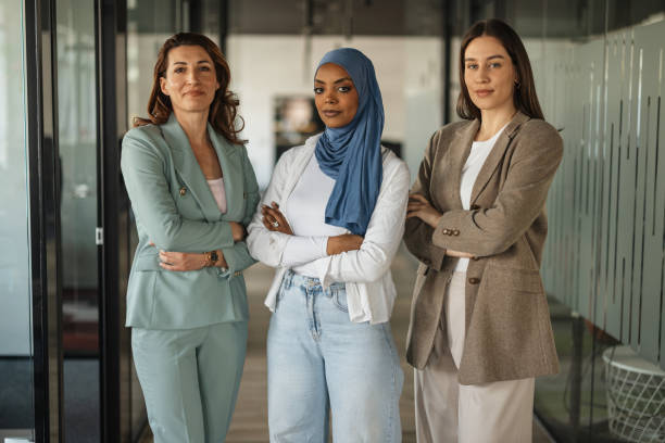 istock Diverse Women Standing Proudly in Office Corridor 2205509548
