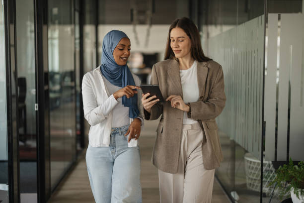 istock Women Having a Productive Discussion in Office 2205509641