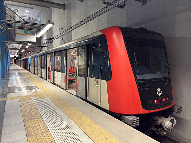 train stopping at subway station