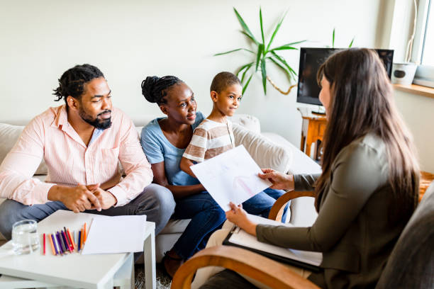 istock Family Meeting with Advisor at Home 2205511481