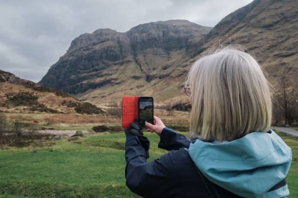 istock Woman at Clachaig, Glencoe, Scotland. 2205515816