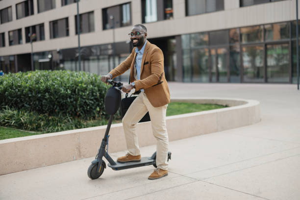 istock Man riding electric scooter, stylish urban transport 2205516501